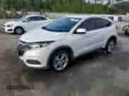 2021 Honda HR-V LX с VIN 3CZRU5H35MM721161, выставлен на аукционе Copart как лот 72013505 с пробегом 54 955 миль миль и Списание • Salvage title. История ставок и продаж доступна на DreamBid. Изображение 1.