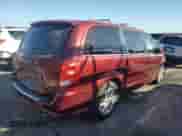 2018 Dodge Grand Caravan SXT with VIN 2C4RDGCG1JR297512, listed as a Copart auction lot 84973275 with 76,009 mi miles and Salvage title. Bid and sale history available at DreamBid. Image 3.