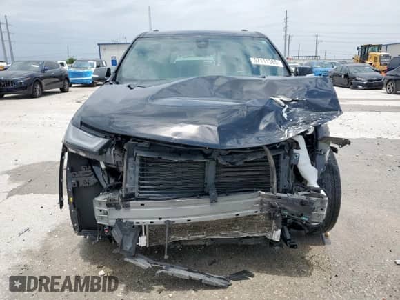 2022 Chevrolet Traverse Premier with VIN 1GNEVKKW3NJ123529, listed as a Copart auction lot 57111385 with 48,158 mi miles and Clean title. Bid and sale history available at DreamBid. Image 5.