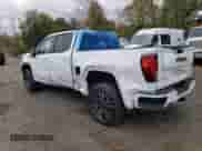 2025 GMC Sierra 1500 AT4 with VIN 1GTUUEE88SZ254846, listed as a Copart auction lot 90012235 with 3,709 mi miles and Salvage title. Bid and sale history available at DreamBid. Image 2.