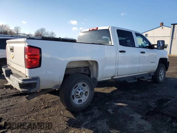 2019 Chevrolet Silverado 2500HD Work Truck z VIN 1GC1KREG7KF124470, wystawiony jako Copart lot #82181094 z przebiegiem 128 984 mil mil oraz Szkoda całkowita • Salvage title. Historia ofert i sprzedaży dostępna na DreamBid. Obrazek 3.