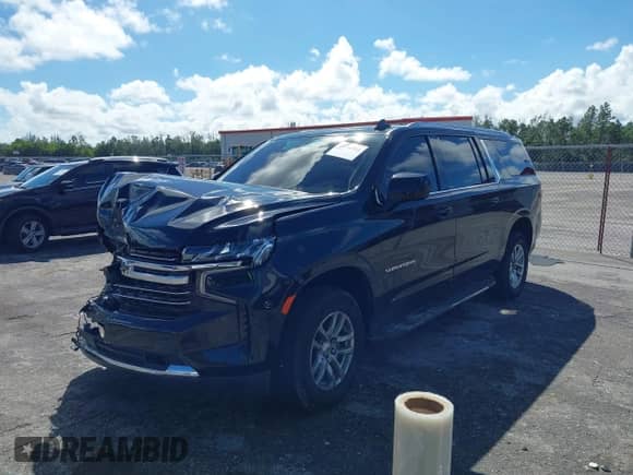 2021 Chevrolet Suburban LT with VIN 1GNSCCKD1MR421283, listed as a IAAI auction lot 43396585 with 132,534 mi miles and . Bid and sale history available at DreamBid. Image 2.