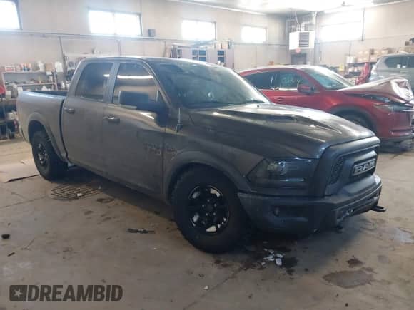 2018 Ram 1500 Rebel with VIN 1C6RR7YT1JS234777, listed as a IAAI auction lot 41409525 with 119,497 mi miles and . Bid and sale history available at DreamBid. Image 1.
