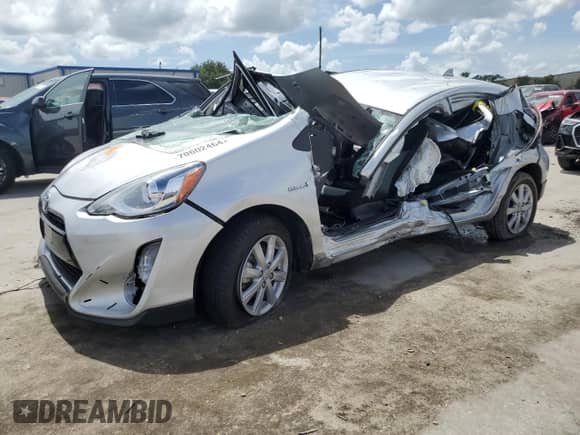 2017 Toyota Prius One z VIN JTDKDTB39H1598651, wystawiony jako Copart lot #70602464 z przebiegiem Nie podano mil oraz Nie do naprawy • Non repairable. Historia ofert i sprzedaży dostępna na DreamBid. Obrazek 1.