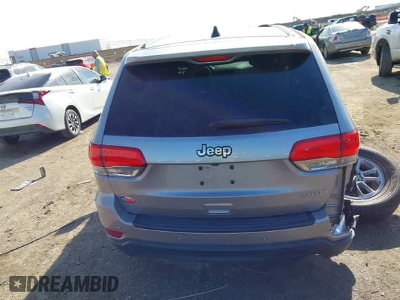 2018 Jeep Grand Cherokee Altitude z VIN 1C4RJEAGXJC429126, wystawiony jako IAAI lot #41300948 z przebiegiem 61 683 mil mil oraz . Historia ofert i sprzedaży dostępna na DreamBid. Obrazek 16.