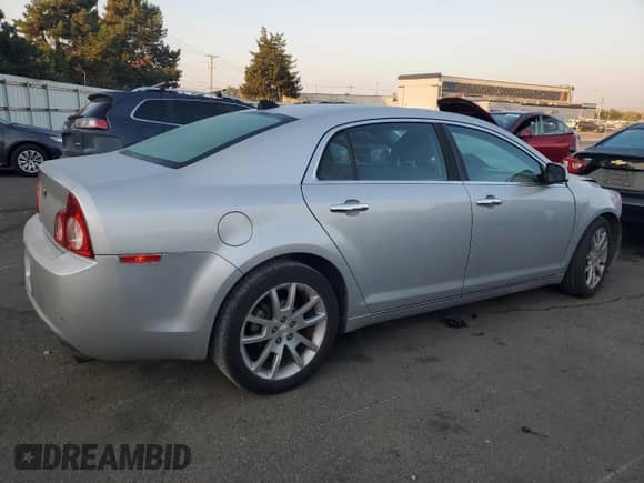 2012 Chevrolet Malibu LTZ with VIN 1G1ZG5E79CF165898, listed as a Copart auction lot 80611505 with 159,645 mi miles and Salvage title. Bid and sale history available at DreamBid. Image 3.