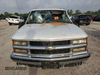 1996 Chevrolet Suburban с VIN 1GNEC16RXTJ391298, выставлен на аукционе Copart как лот 65437144 с пробегом 155 063 миль миль и Списание • Salvage title. История ставок и продаж доступна на DreamBid. Изображение 5.