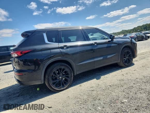 2023 Mitsubishi Outlander SE with VIN JA4J3UA85PZ013351, listed as a Copart auction lot 80062325 with 74,432 mi miles and Salvage title. Bid and sale history available at DreamBid. Image 3.