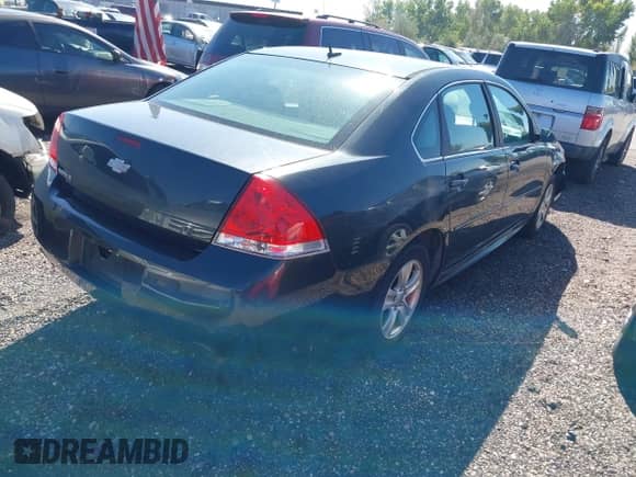 2013 Chevrolet Impala LS with VIN 2G1WF5E34D1145828, listed as a IAAI auction lot 43357828 with 186,894 mi miles and . Bid and sale history available at DreamBid. Image 4.