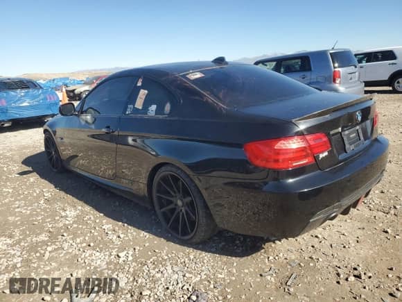 2011 BMW 3 Series 335i with VIN WBAKG7C57BE599020, listed as a Copart auction lot 90125035 with Not provided miles and Clean title. Bid and sale history available at DreamBid. Image 2.