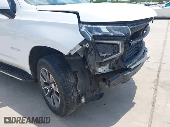 2021 Chevrolet Tahoe LT z VIN 1GNSKNKD0MR488813, wystawiony jako IAAI lot #42418044 z przebiegiem 34 666 mil mil oraz . Historia ofert i sprzedaży dostępna na DreamBid. Obrazek 17.