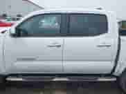 2021 Toyota Tacoma Limited with VIN 3TMGZ5AN1MM396485, listed as a IAAI auction lot 41577864 with 60,211 mi miles and . Bid and sale history available at DreamBid. Image 15.
