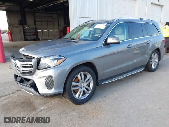 2017 Mercedes-Benz GLS 450 with VIN 4JGDF6EE6HA770387, listed as a IAAI auction lot 43050470 with 104,872 mi miles and . Bid and sale history available at DreamBid. Image 2.
