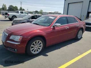 2013 Chrysler 300 C with VIN 2C3CCAET2DH556412, listed as a Copart auction lot 60144115 with 91,674 mi miles and Salvage title. Bid and sale history available at DreamBid. Image 1.