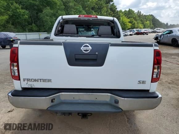2010 Nissan Frontier SE with VIN 1N6AD0ER8AC433126, listed as a Copart auction lot 69820005 with Not provided miles and Salvage title. Bid and sale history available at DreamBid. Image 6.