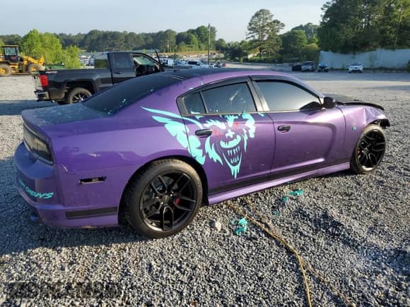 2013 Dodge Charger SRT-8 z VIN 2C3CDXEJ5DH740838, wystawiony jako Copart lot #57058225 z przebiegiem 127 808 mil mil oraz Szkoda całkowita • Salvage title. Historia ofert i sprzedaży dostępna na DreamBid. Obrazek 3.