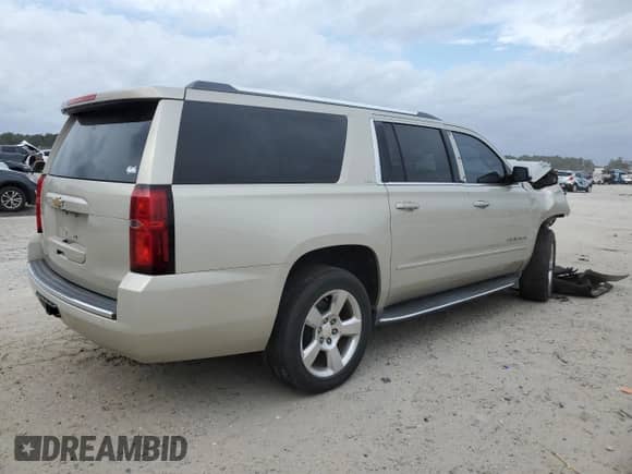 2016 Chevrolet Suburban LTZ z VIN 1GNSCJKCXGR215959, wystawiony jako Copart lot #41459895 z przebiegiem Nie podano mil oraz Szkoda całkowita • Salvage title. Historia ofert i sprzedaży dostępna na DreamBid. Obrazek 3.