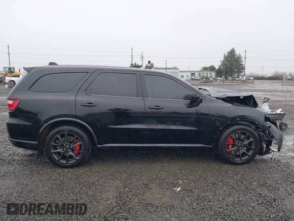 2021 Dodge Durango SRT Hellcat with VIN 1C4SDJH95MC643177, listed as a IAAI auction lot 41007139 with 31,650 mi miles and . Bid and sale history available at DreamBid. Image 14.