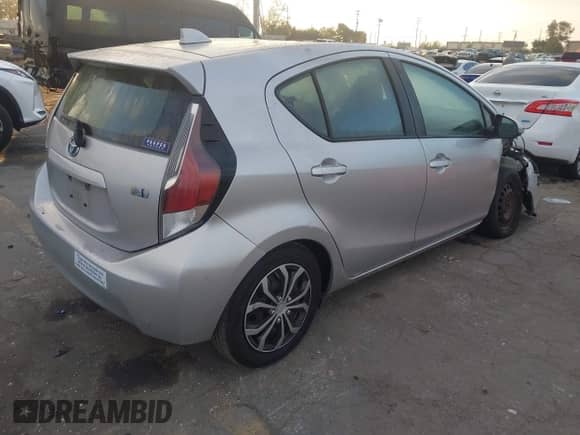 2015 Toyota Prius One z VIN JTDKDTB33F1575685, wystawiony jako IAAI lot #43508333 z przebiegiem 121 064 mil mil oraz . Historia ofert i sprzedaży dostępna na DreamBid. Obrazek 4.