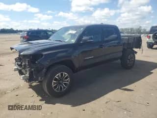 2023 Toyota Tacoma SR z VIN 3TMCZ5AN8PM574072, wystawiony jako Copart lot #67066385 z przebiegiem 60 992 mil mil oraz Szkoda całkowita • Salvage title. Historia ofert i sprzedaży dostępna na DreamBid. Obrazek 1.