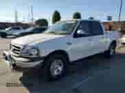 2002 Ford F-150 XLT с VIN 1FTRW07L52KA32293, выставлен на аукционе Copart как лот 81226245 с пробегом 472 017 миль миль и Списание • Salvage title. История ставок и продаж доступна на DreamBid. Изображение 1.