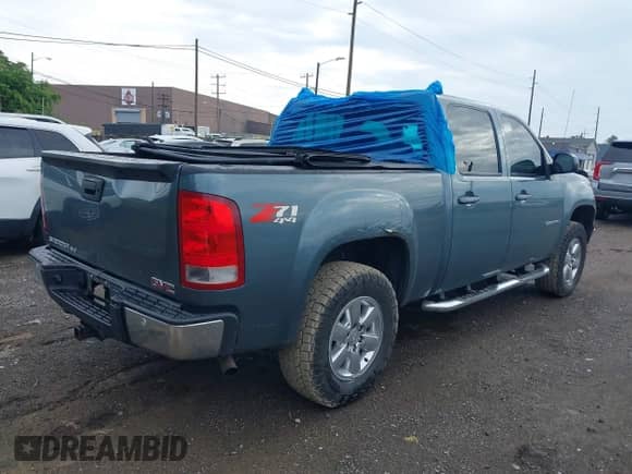 2009 GMC Sierra 1500 SLT with VIN 3GTEK33M59G212255, listed as a IAAI auction lot 42751396 with 176,279 mi miles and . Bid and sale history available at DreamBid. Image 4.