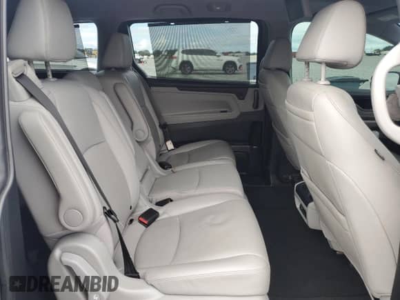 2023 Honda Odyssey Touring z VIN 5FNRL6H87PB015263, wystawiony jako Copart lot #86329635 z przebiegiem 58 942 mil mil oraz Szkoda całkowita • Salvage title. Historia ofert i sprzedaży dostępna na DreamBid. Obrazek 11.