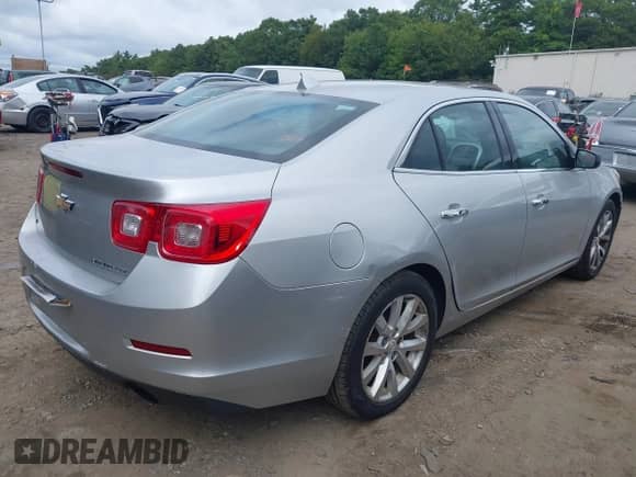 2014 Chevrolet Malibu LTZ with VIN 1G11H5SL9EF283464, listed as a IAAI auction lot 43175991 with 152,874 mi miles and . Bid and sale history available at DreamBid. Image 4.