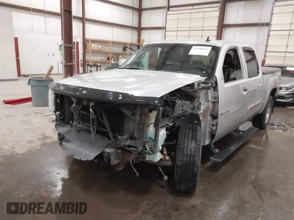 2011 GMC Sierra 1500 SLT z VIN 3GTP2WE35BG123533, wystawiony jako IAAI lot #41990602 z przebiegiem 150 403 mil mil oraz . Historia ofert i sprzedaży dostępna na DreamBid. Obrazek 6.