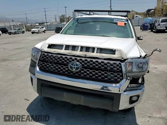 2019 Toyota Tundra SR с VIN 5TFRM5F14KX143150, выставлен на аукционе Copart как лот 63068995 с пробегом Не указан миль и Списание • Salvage title. История ставок и продаж доступна на DreamBid. Изображение 14.