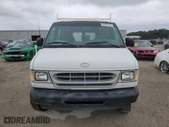 2002 Ford Econoline Cargo с VIN 1FTNE24L82HB20009, выставлен на аукционе Copart как лот 88262735 с пробегом 150 607 миль миль и Чистый • Clean title. История ставок и продаж доступна на DreamBid. Изображение 5.
