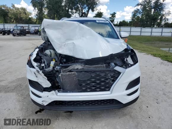 2021 Hyundai Tucson Value с VIN KM8J33A40MU311842, выставлен на аукционе Copart как лот 82171885 с пробегом 59 277 миль миль и Списание • Salvage title. История ставок и продаж доступна на DreamBid. Изображение 5.