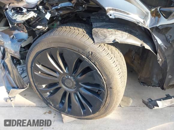 2023 Tesla Model Y Long Range z VIN 7SAYGAEE7PF767951, wystawiony jako IAAI lot #43128878 z przebiegiem 36 431 mil mil oraz . Historia ofert i sprzedaży dostępna na DreamBid. Obrazek 21.