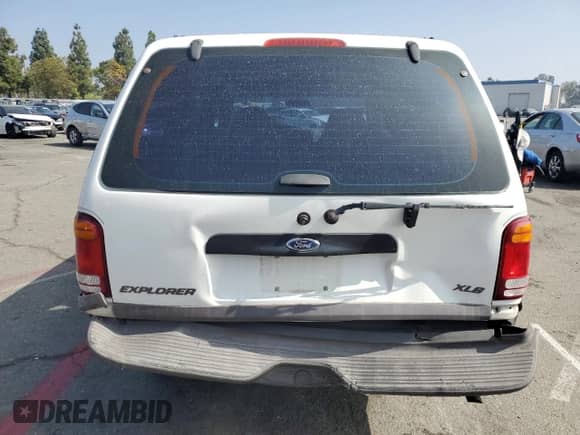 1999 Ford Explorer XL with VIN 1FMZU32X8XZB64735, listed as a Copart auction lot 82251585 with 189,401 mi miles and Salvage title. Bid and sale history available at DreamBid. Image 6.