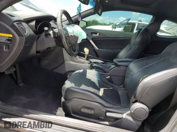 2013 Hyundai Genesis Coupe Grand Touring с VIN KMHHU6KJ4DU108695, выставлен на аукционе Copart как лот 70326845 с пробегом 187 247 миль миль и Списание • Salvage title. История ставок и продаж доступна на DreamBid. Изображение 7.