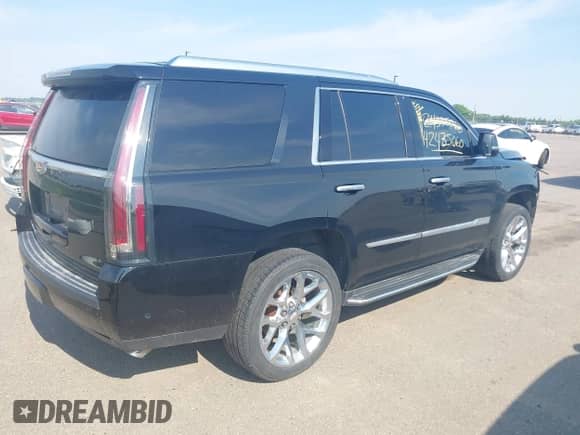 2018 Cadillac Escalade Premium Luxury with VIN 1GYS4CKJXJR257744, listed as a IAAI auction lot 42435060 with 112,096 mi miles and . Bid and sale history available at DreamBid. Image 4.