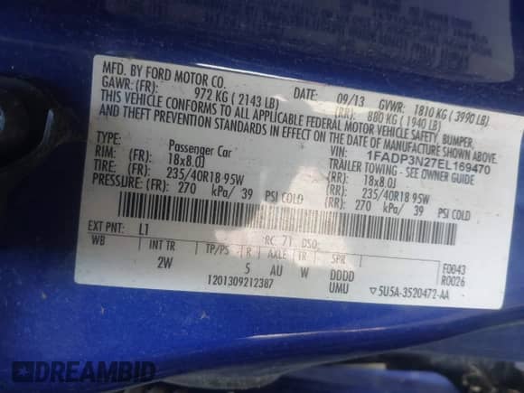 2014 Ford Focus Titanium z VIN 1FADP3N27EL169470, wystawiony jako IAAI lot #43073602 z przebiegiem 244 891 mil mil oraz . Historia ofert i sprzedaży dostępna na DreamBid. Obrazek 9.