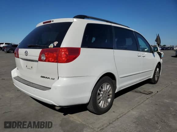 2010 Toyota Sienna XLE с VIN 5TDYK4CC3AS310667, выставлен на аукционе Copart как лот 86077205 с пробегом 184 017 миль миль и Списание • Salvage title. История ставок и продаж доступна на DreamBid. Изображение 3.