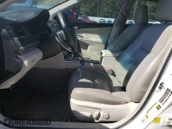 2012 Toyota Camry XLE z VIN 4T1BD1FK8CU022512, wystawiony jako Copart lot #82413865 z przebiegiem Nie podano mil oraz Szkoda całkowita • Salvage title. Historia ofert i sprzedaży dostępna na DreamBid. Obrazek 7.