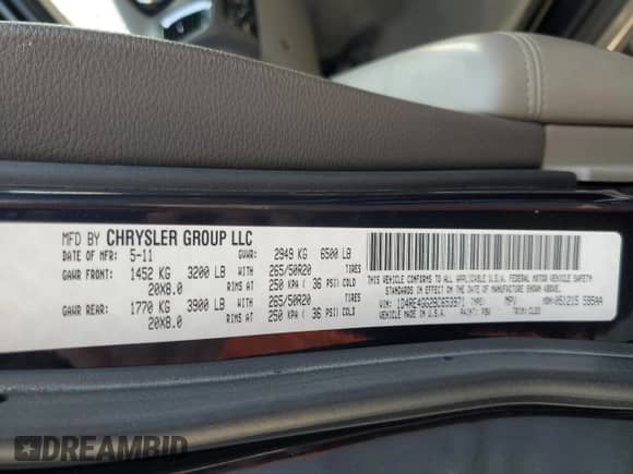 2011 Dodge Durango Crew z VIN 1D4RE4GG2BC653971, wystawiony jako Copart lot #71115505 z przebiegiem 137 262 mil mil oraz Szkoda całkowita • Salvage title. Historia ofert i sprzedaży dostępna na DreamBid. Obrazek 13.