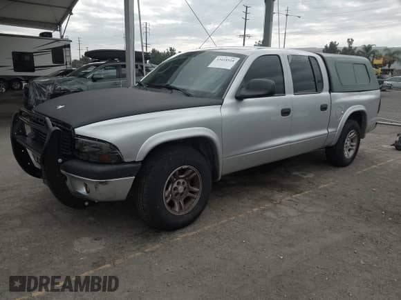 2004 Dodge Dakota Sport with VIN 1D7HL38NX4S535266, listed as a IAAI auction lot 43418518 with 160,287 mi miles and . Bid and sale history available at DreamBid. Image 2.