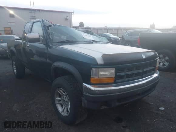 1993 Dodge Dakota z VIN 1B7GG23X7PS200435, wystawiony jako IAAI lot #41060856 z przebiegiem 249 117 mil mil oraz . Historia ofert i sprzedaży dostępna na DreamBid. Obrazek 1.