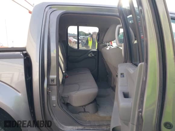 2016 Nissan Frontier SV with VIN 1N6AD0EV7GN750048, listed as a IAAI auction lot 43334744 with 105,698 mi miles and . Bid and sale history available at DreamBid. Image 8.