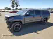 2015 Toyota Tacoma with VIN 5TFJX4CN8FX063880, listed as a Copart auction lot 68765415 with 115,810 mi miles and Salvage title. Bid and sale history available at DreamBid. Image 1.