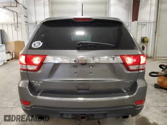 2011 Jeep Grand Cherokee Overland with VIN 1J4RR6GT3BC736328, listed as a Copart auction lot 85365985 with 312,134 mi miles and Clean title. Bid and sale history available at DreamBid. Image 6.