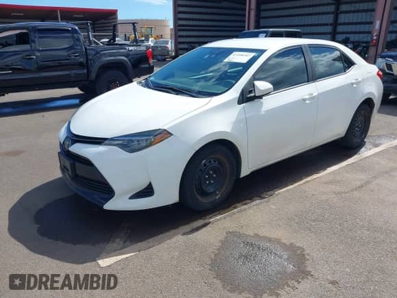 2019 Toyota Corolla L z VIN 5YFBURHE0KP903078, wystawiony jako IAAI lot #43108347 z przebiegiem 59 990 mil mil oraz . Historia ofert i sprzedaży dostępna na DreamBid. Obrazek 18.