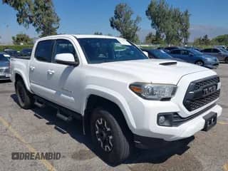 2017 Toyota Tacoma SR5 with VIN 3TMAZ5CN1HM037971, listed as a IAAI auction lot 42658632 with 67,228 mi miles and . Bid and sale history available at DreamBid. Image 1.