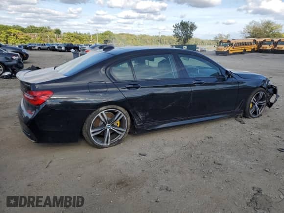 2019 BMW 7 Series 750i xDrive with VIN WBA7F2C58KB240403, listed as a Copart auction lot 84191915 with 56,854 mi miles and Salvage title. Bid and sale history available at DreamBid. Image 3.
