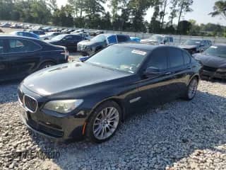 2013 BMW 7 Series 750i with VIN WBAYA8C51DC996710, listed as a Copart auction lot 69549145 with 158,580 mi miles and Clean title. Bid and sale history available at DreamBid. Image 1.