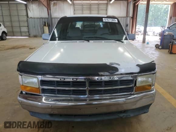 1994 Dodge Dakota z VIN 1B7GL23X7RS709259, wystawiony jako Copart lot #61671365 z przebiegiem 246 935 mil mil oraz Szkoda całkowita • Salvage title. Historia ofert i sprzedaży dostępna na DreamBid. Obrazek 5.